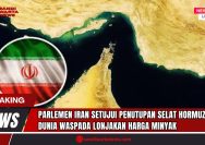 Doc. Doc. Ilustrasi peta kawasan Teluk Persia dengan sorotan pada Selat Hormuz dan bendera Iran, menggambarkan ketegangan geopolitik pasca keputusan parlemen Iran untuk menutup jalur strategis tersebut yang mengalirkan seperempat pasokan minyak dunia. (Doc:SandiWartaNews.com).